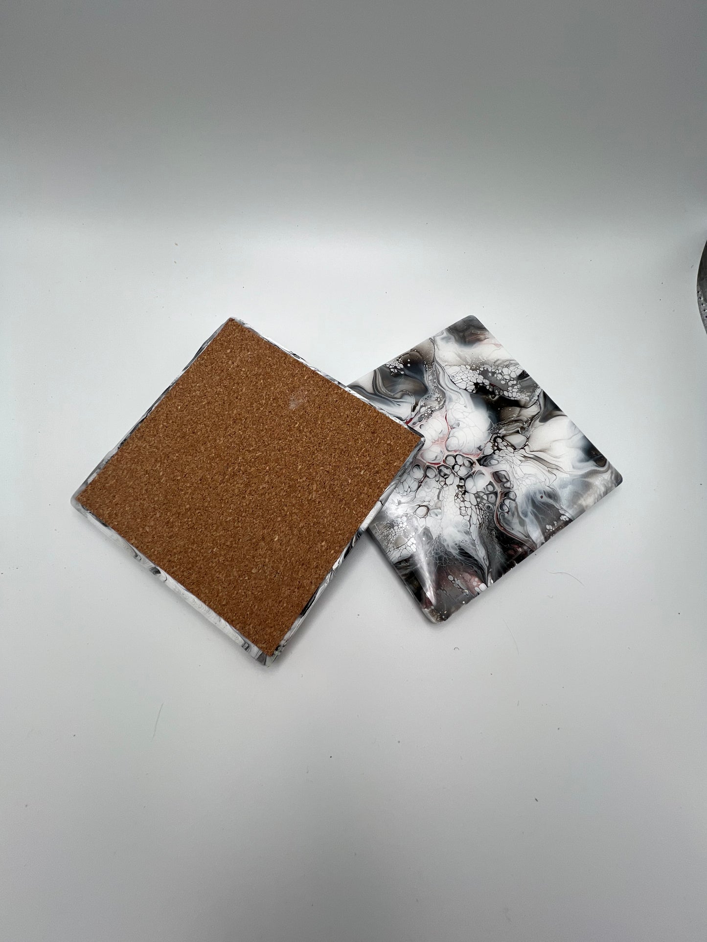 Black And White Coasters With A Touch Of Red Copper