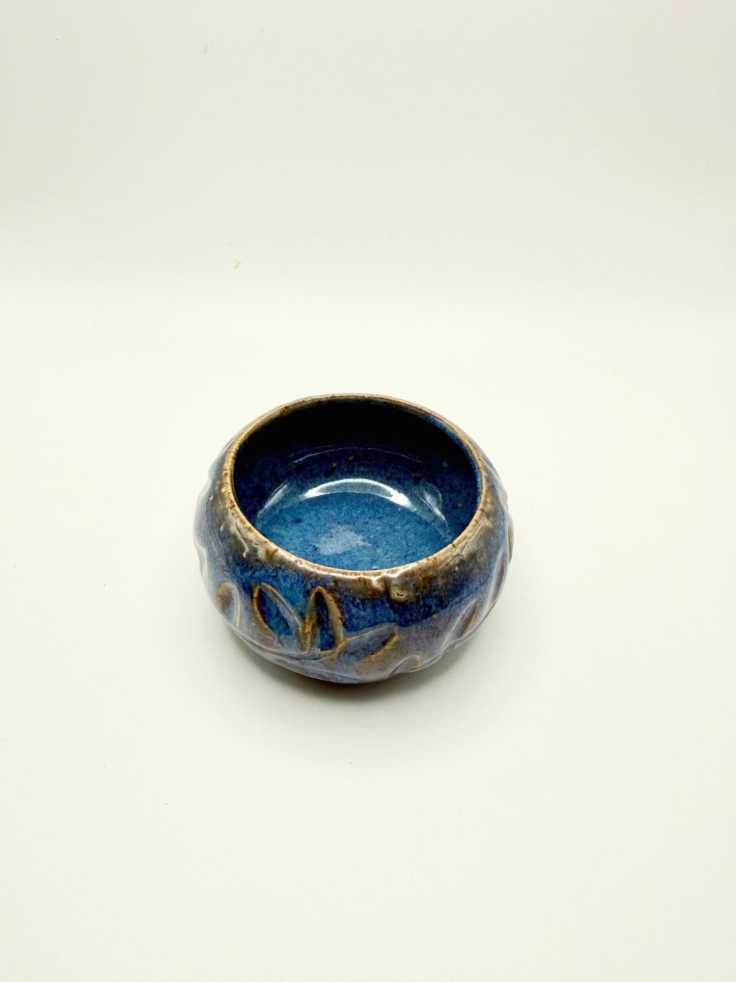 Small blue sculpted bowl