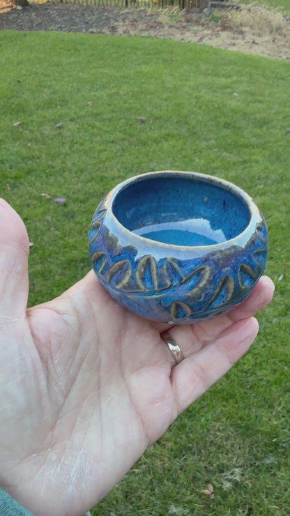 Small blue sculpted bowl